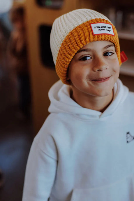 muts curry grandma gebreid hellohossy beige oker geel kindermuts