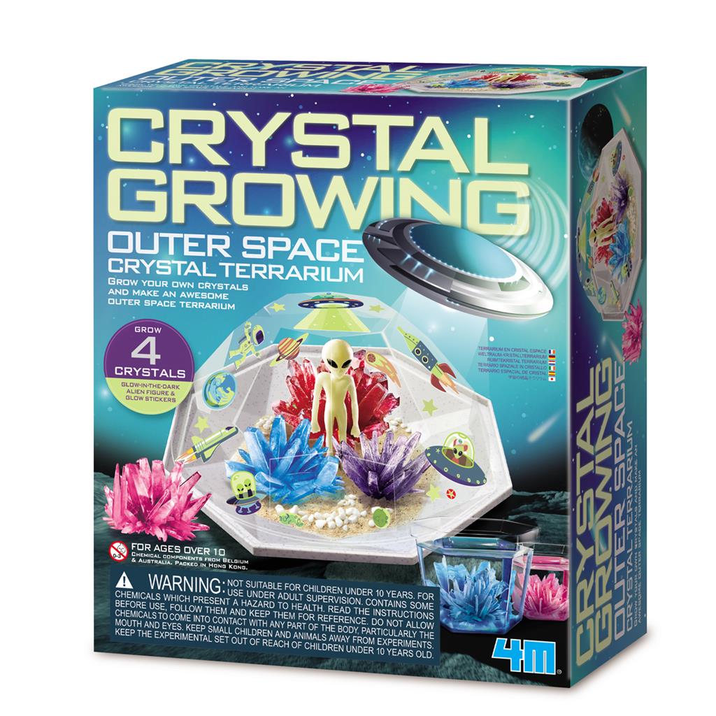 Verpakking van Groei Je Eigen Ruimte Kristallen met een ruimteterrarium, gekleurde kristallen en een alien.