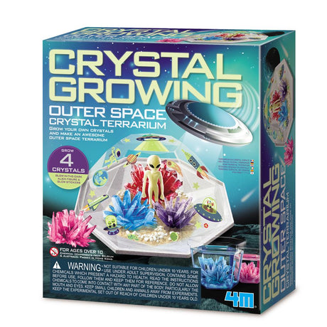 Verpakking van Groei Je Eigen Ruimte Kristallen met een ruimteterrarium, gekleurde kristallen en een alien.